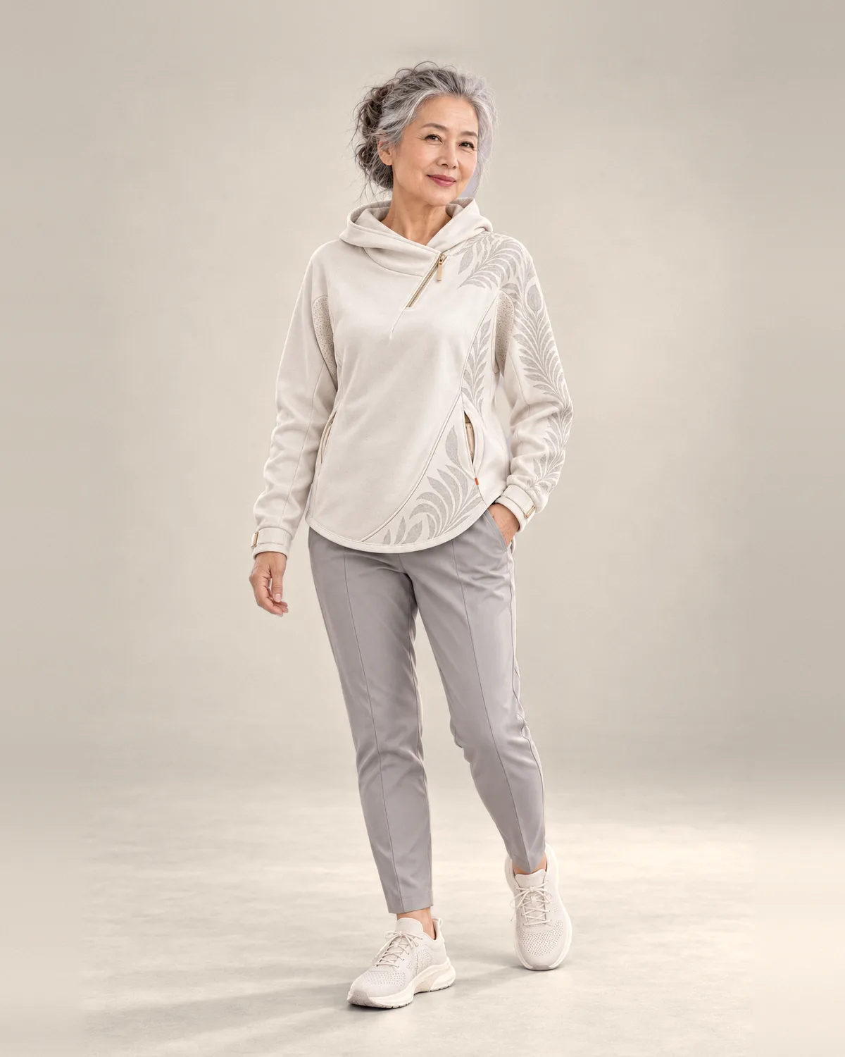 Woman wearing the Movement Hood in Pearl
