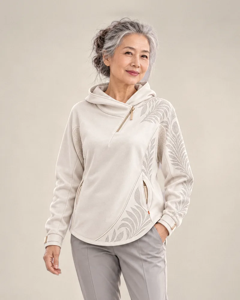 Woman wearing the Movement Hood in Pearl