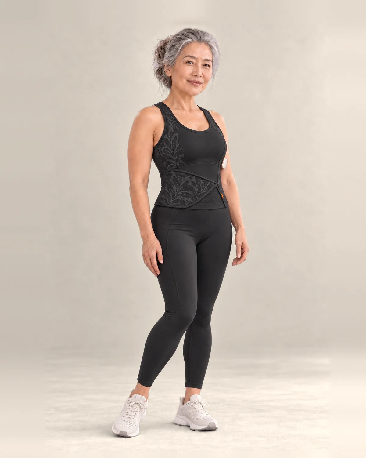 Woman wearing the Movement Tank in Black