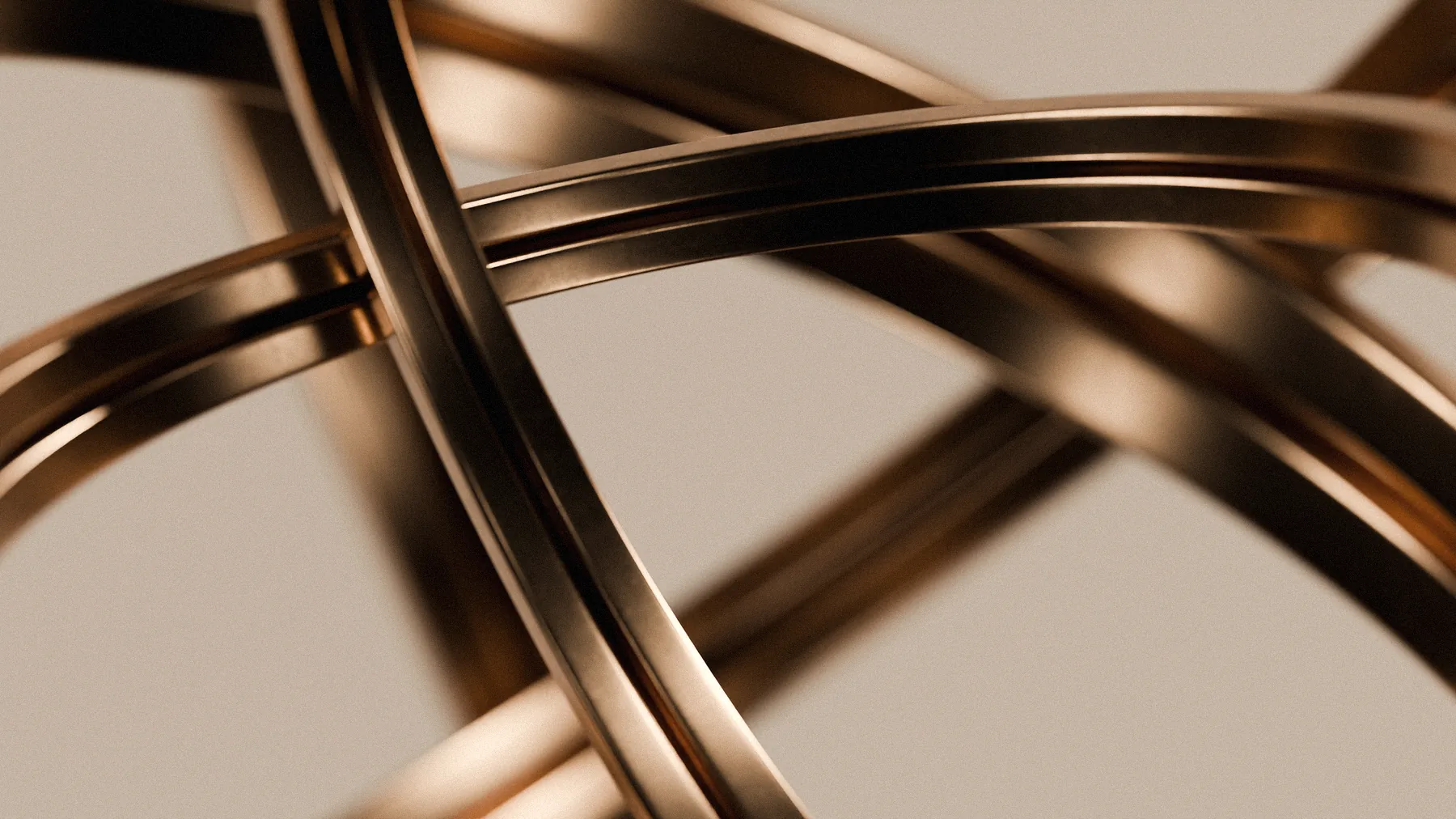 Bronze rings linked together, catching warm light